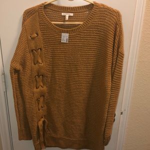 Sz Med Maurice’s golden yellow knot sweater